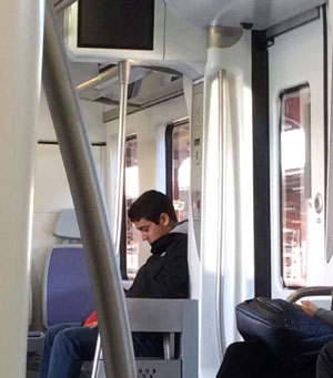 A boy on a train