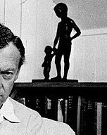Britten in front of a favourite and enigmatic sculpture